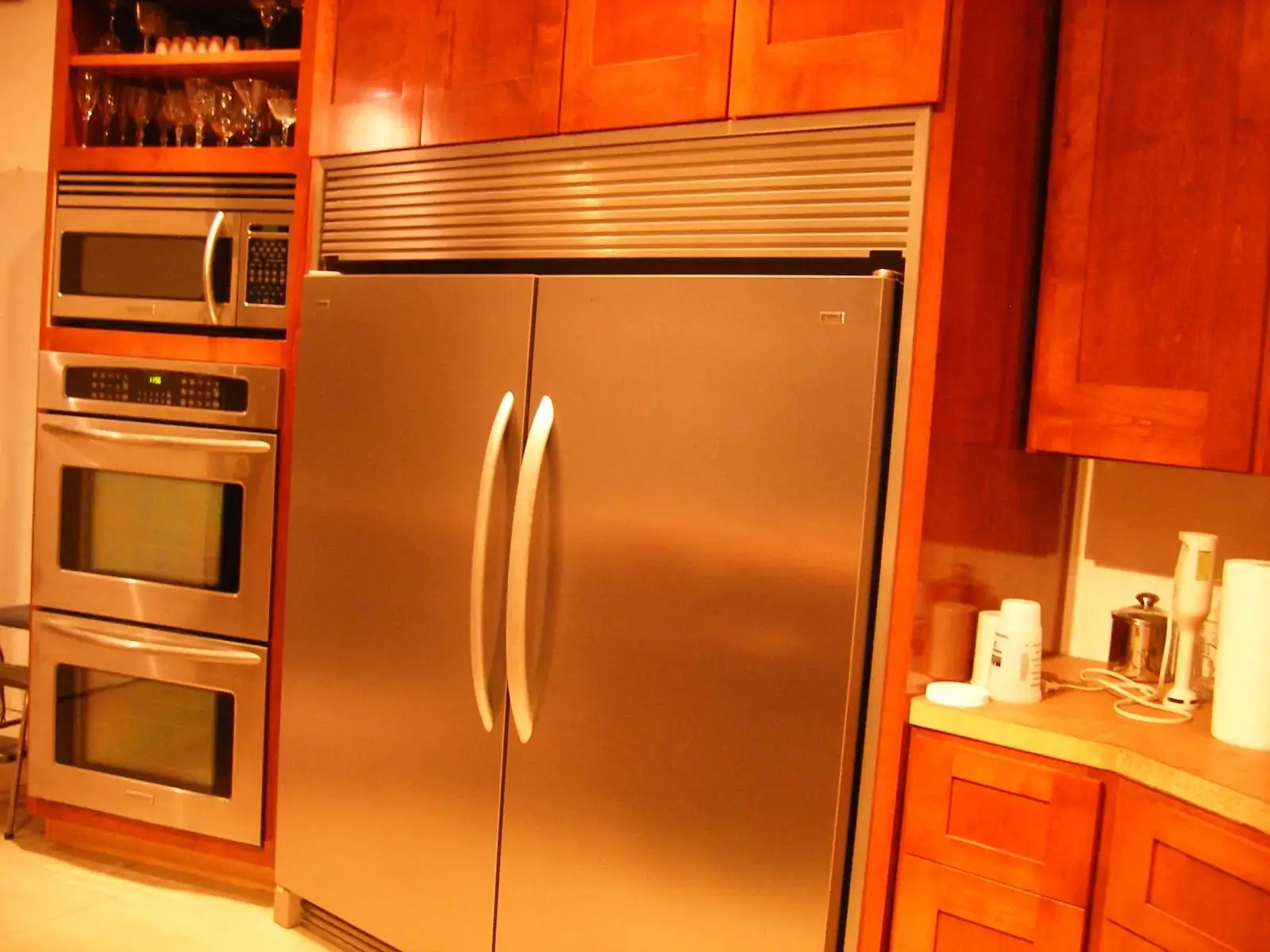 kitchen-with-stainless-steel-appliances-and-wood-cabinets kitchen-with-stainless-steel-appliances-and-wood-cabinets
